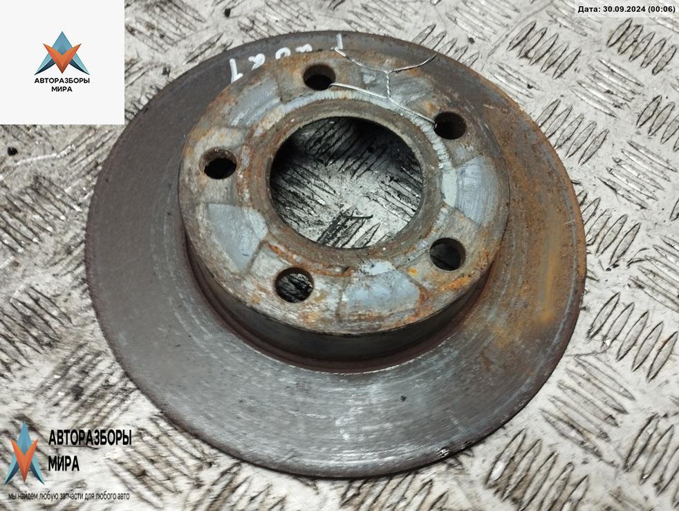 диск тормозной задний Audi A4 B5 1997, 2.8 л., бензин, АКПП, зелёный, универсал - фото №1