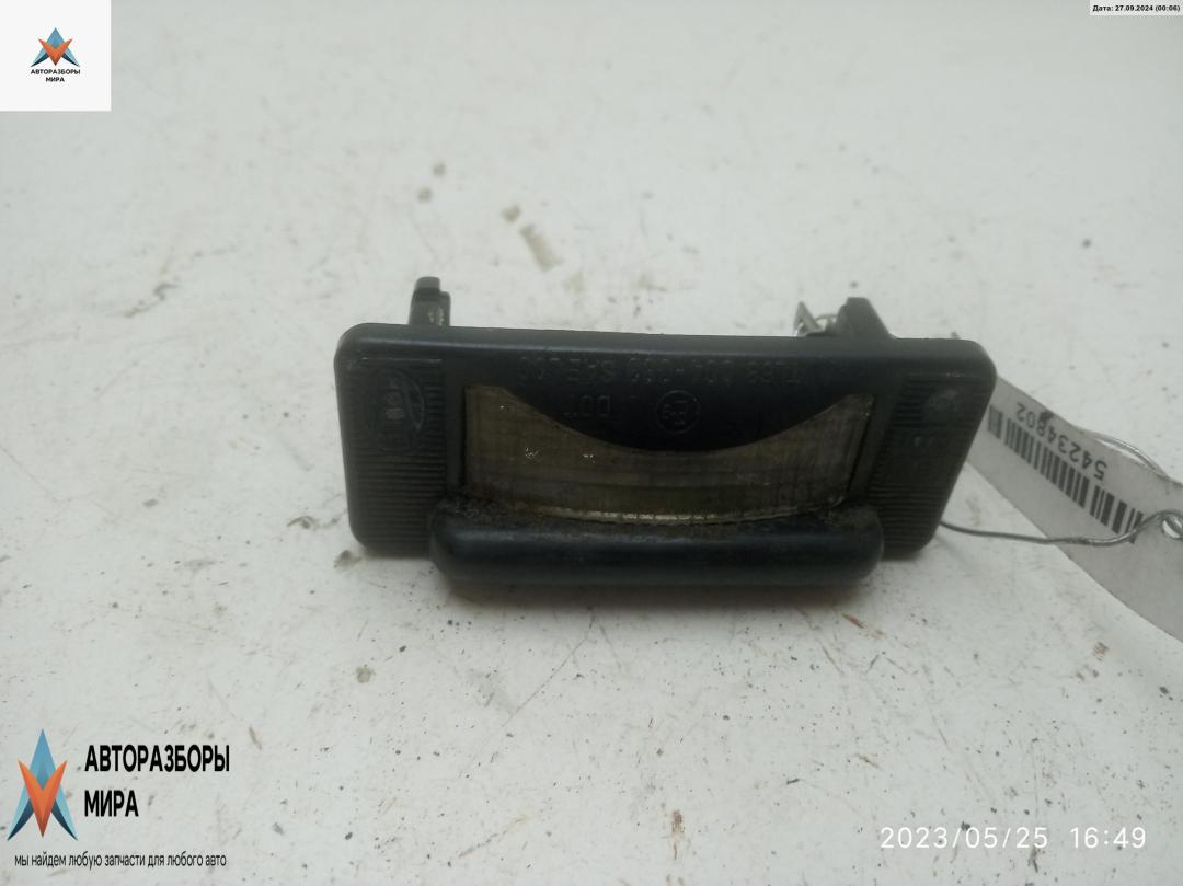 подсветка номера Volkswagen LT 2 поколение 2005, 2.5 л., дизель, МКПП, белый, микроавтобус, 2D0943021A - фото №1