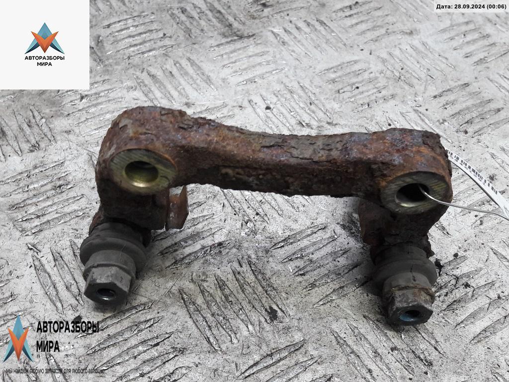 скоба суппорта Volkswagen Golf 4 поколение 1999, 1.4 л., бензин, МКПП, серый, хетчбэк 3 дв. - фото №1