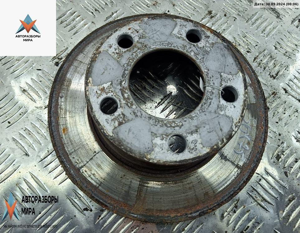 диск тормозной задний Audi A6 4B/C5 2000, 1.8 л., бензин, МКПП, серый, седан - фото №1