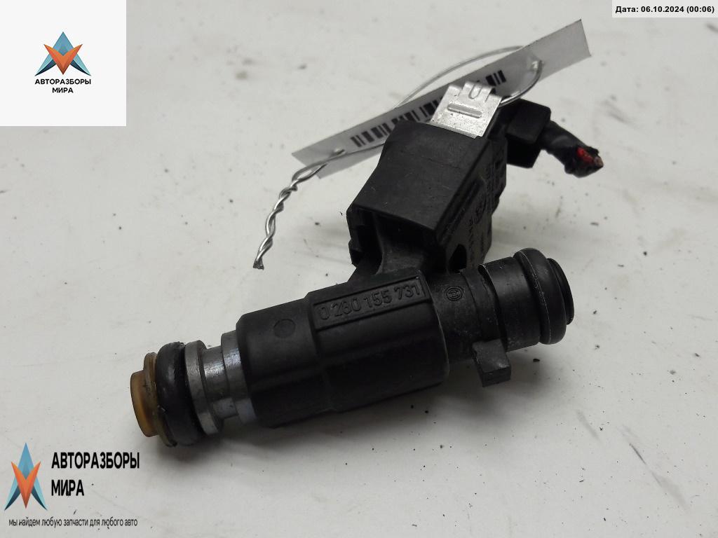 форсунка Volkswagen Golf 3 поколение 1996, 1.4 л., бензин, МКПП, синий, хетчбэк 3 дв., 030906031E - фото №1