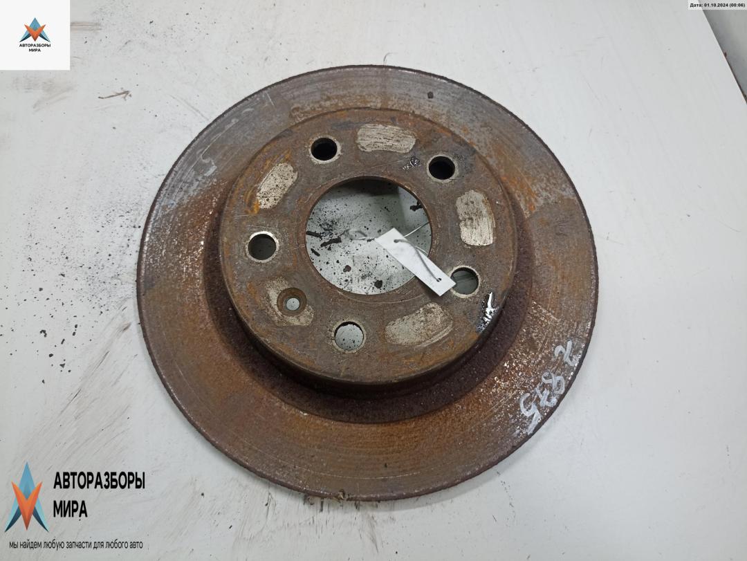 диск тормозной задний Opel Astra G 1998, 1.8 л., бензин, МКПП, серый, хетчбэк 5 дв. - фото №1