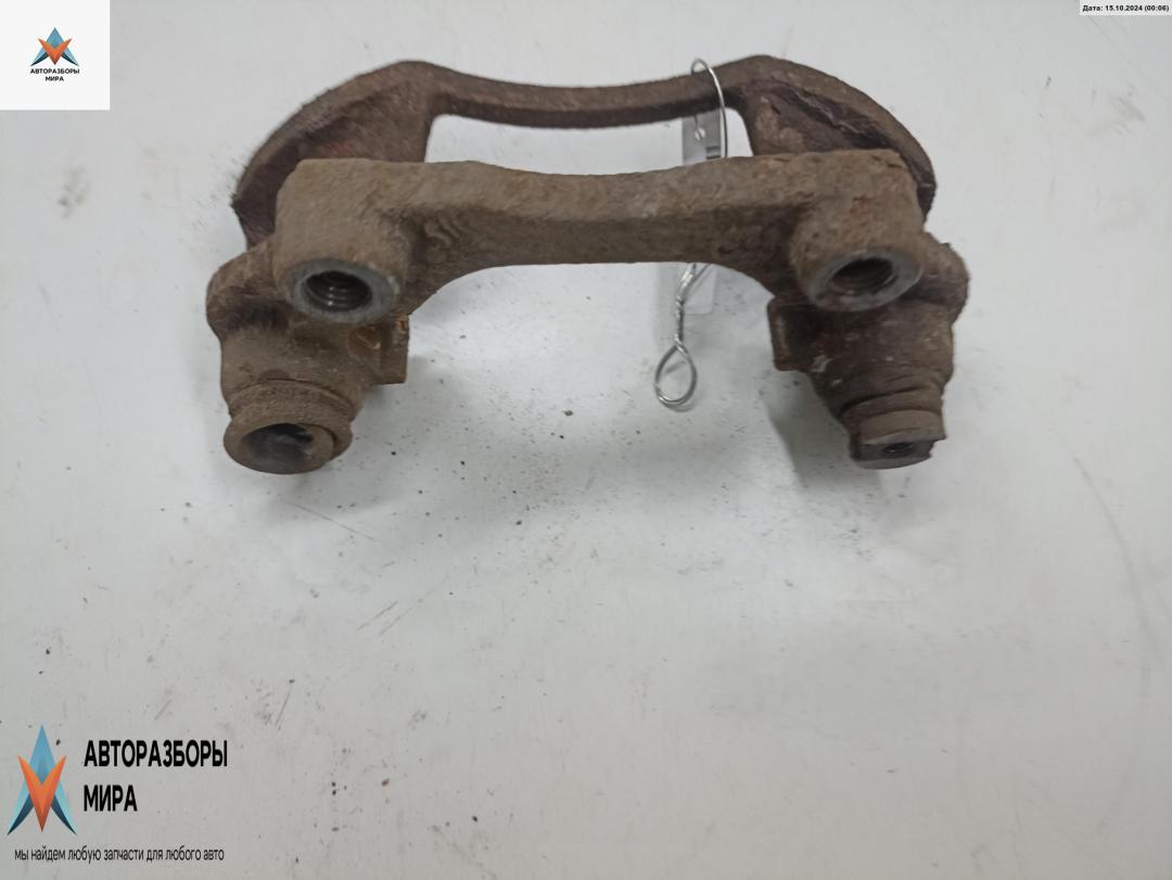 скоба суппорта Opel Zafira 1 поколение (A) 2000, 1.6 л., бензин, МКПП, зелёный, минивэн - фото №1