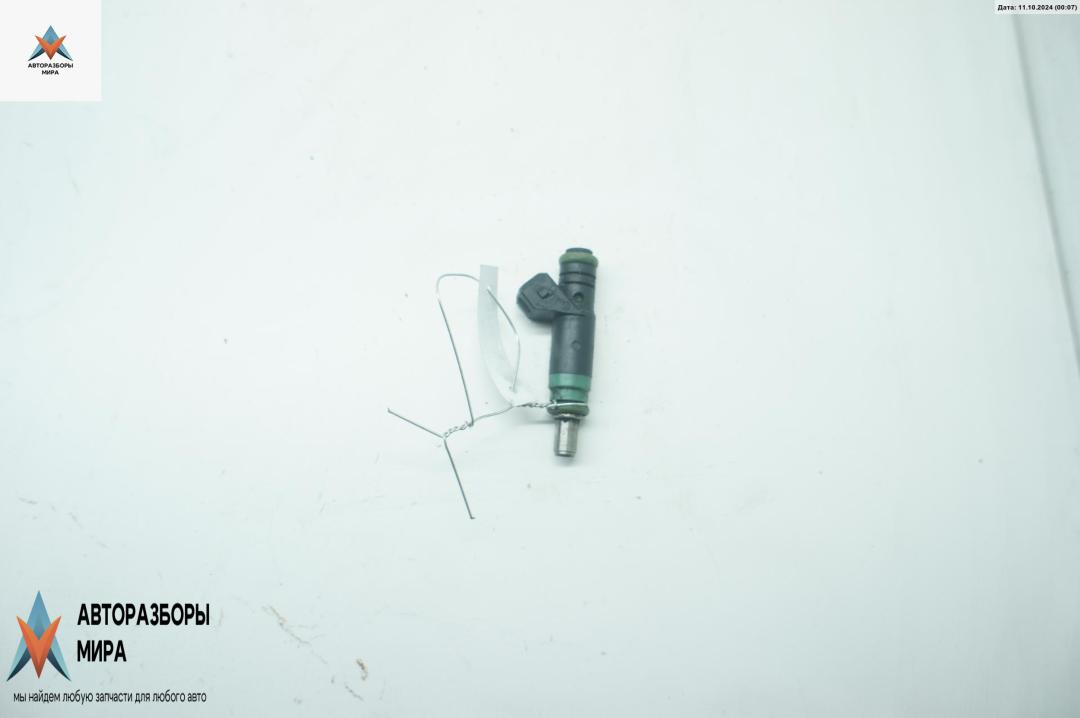 форсунка Ford Focus 1 поколение 2000, 1.6 л., i, бензин, МКПП, чёрный, хетчбэк 5 дв., 98MFBA. - фото №1