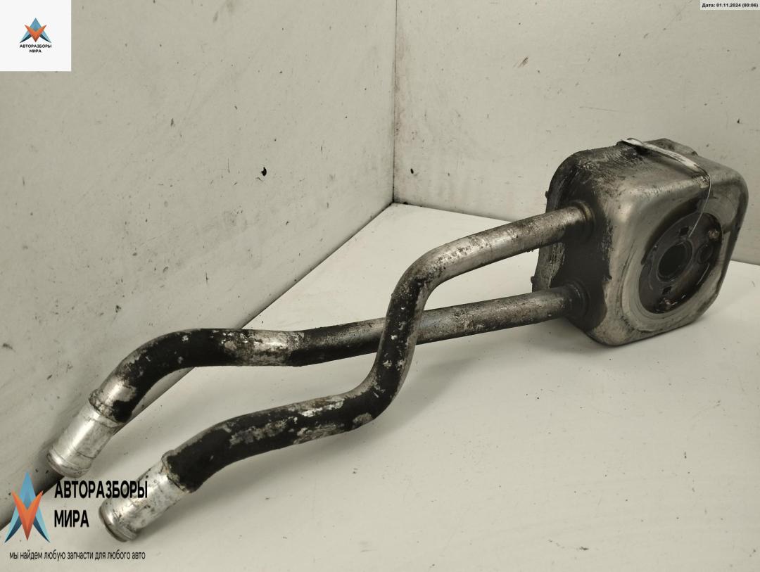 теплообменник масляного фильтра Volkswagen Golf 4 поколение 2001, 1.6 л., бензин, МКПП, серый, хетчбэк 5 дв. - фото №1