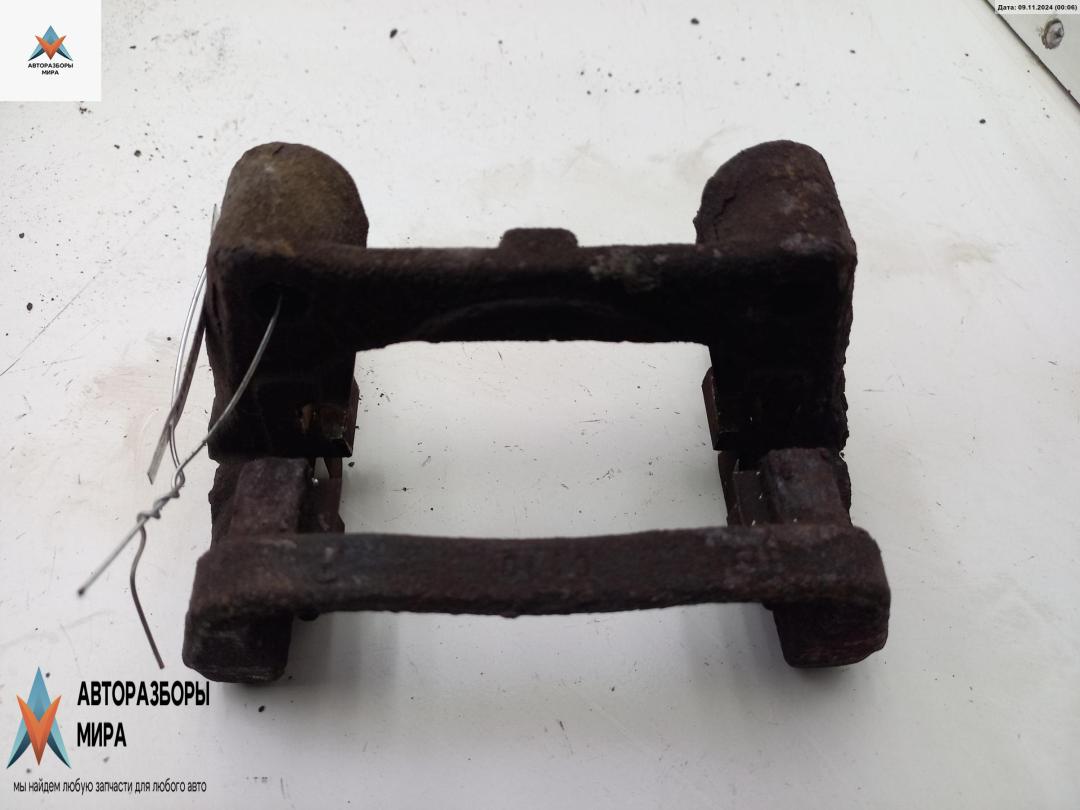 скоба суппорта Opel Astra G 1998, 1.6 л., бензин, МКПП, зелёный, хетчбэк 5 дв., LUCAS - фото №1