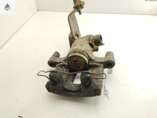 суппорт задний левый Nissan Primera P12 2002, 1.8 л., бензин, МКПП, зелёный, универсал