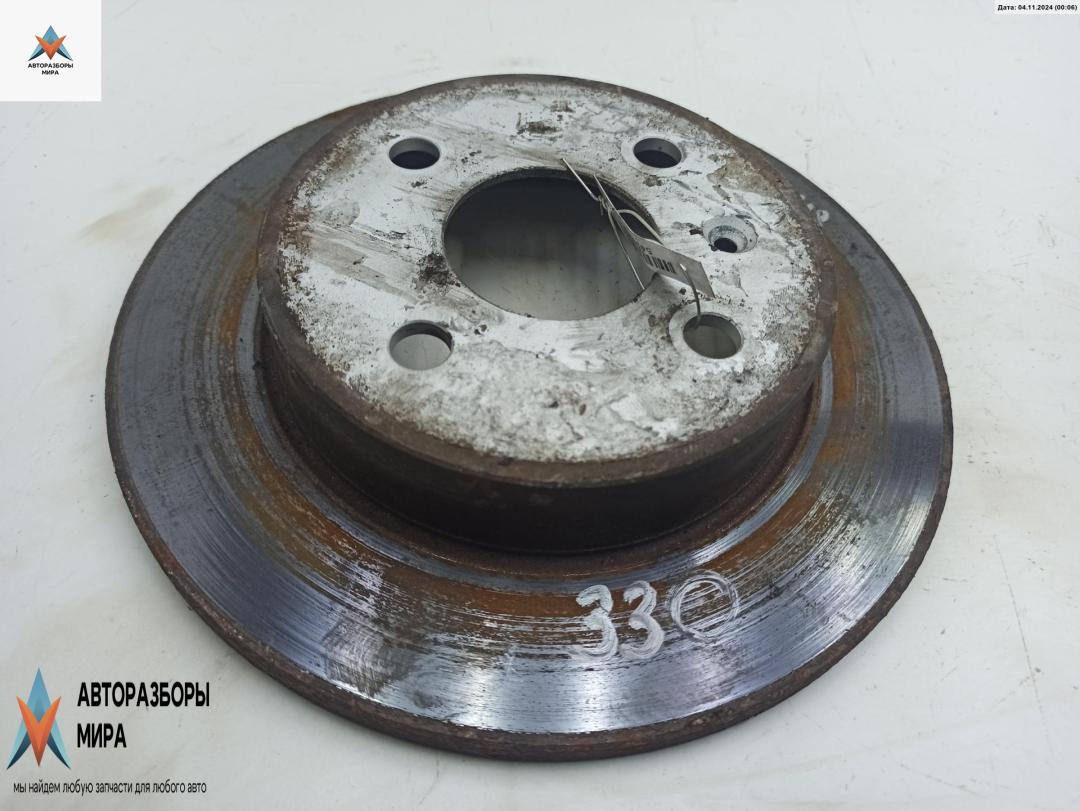 диск тормозной задний Opel Astra G 1998, 1.6 л., бензин, МКПП, серый, хетчбэк 5 дв. - фото №1