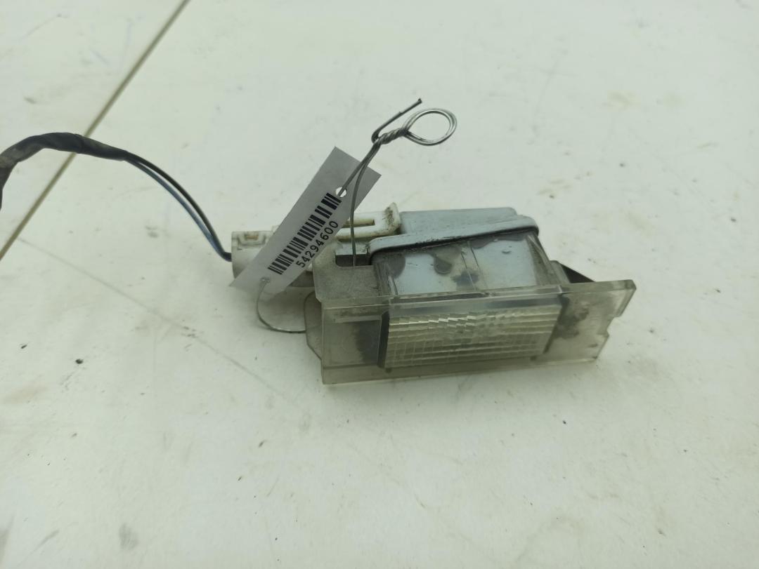 подсветка номера Renault Laguna 2 поколение 2004, 1.6 л., бензин, МКПП, серый, хетчбэк 5 дв., 7700796163 - фото №1