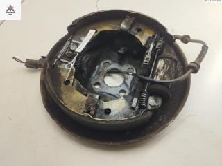 Механизм развода задних тормозных колодок левый Nissan Note E11 2007, 1.5 л., дизель, МКПП, чёрный, хетчбэк 5 дв.