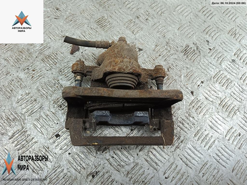 суппорт задний левый Kia Sorento 1 поколение 2004, 2.5 л., дизель, АКПП, чёрный, внедорожник 5 дв. - фото №1