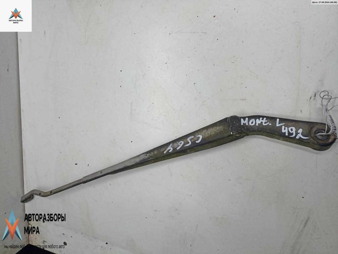 Щеткодержатель (поводок стеклоочистителя) передний Opel Monterey 1 поколение 1993, 3.1 л., дизель, МКПП, коричневый, внедорожник 5 дв. - фото №1