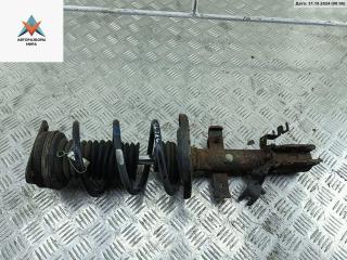 стойка передняя Renault Clio 3 поколение [рестайлинг] 2011, 1.2 л., бензин, МКПП, серый, универсал