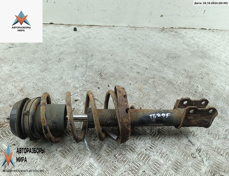 стойка передняя Opel Astra G 2000, 1.6 л., бензин, МКПП, зелёный, хетчбэк 5 дв. - фото №1