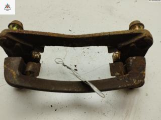 скоба суппорта Mazda Xedos 9 1 поколение [2-й рестайлинг] 2000, 2.0 л., бензин, МКПП, серый, седан