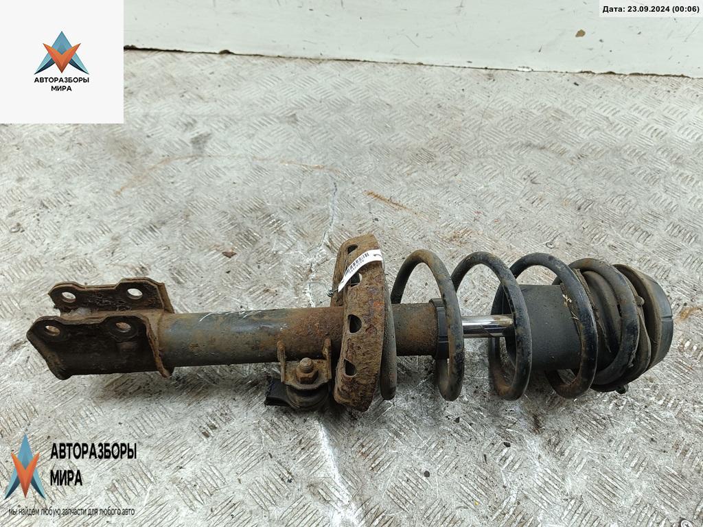 стойка передняя Opel Astra G 2002, 1.6 л., бензин, МКПП, синий, хетчбэк 5 дв. - фото №1