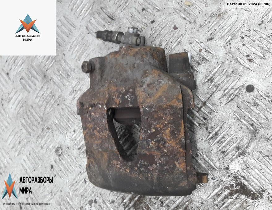 суппорт передний правый Volkswagen Golf 5 поколение 2004, 1.4 л., бензин, МКПП, серый, хетчбэк 5 дв. - фото №1