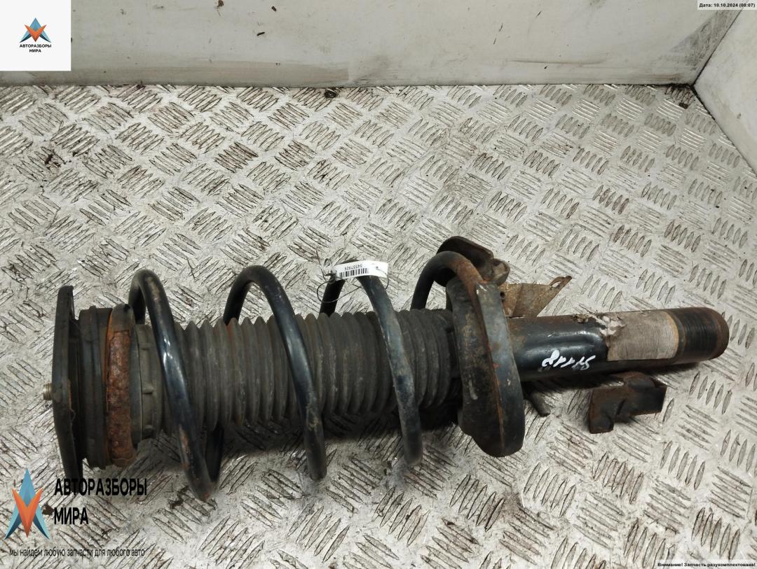 стойка передняя Ford Focus 2 поколение 2005, 1.6 л., i, бензин, МКПП, синий, хетчбэк 5 дв. - фото №1