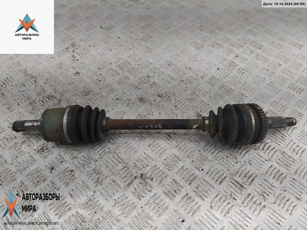 полуось передняя левая (приводной вал, ШРУС) Mazda 323C BA 1995, 1.8 л., бензин, АКПП, белый, хетчбэк 3 дв. - фото №1