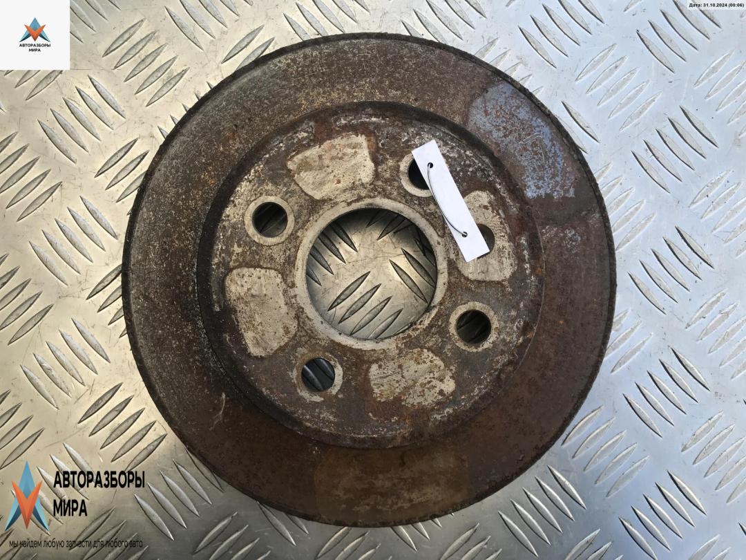 диск тормозной задний Opel Astra G 1998, 1.6 л., бензин, МКПП, красный, универсал - фото №1