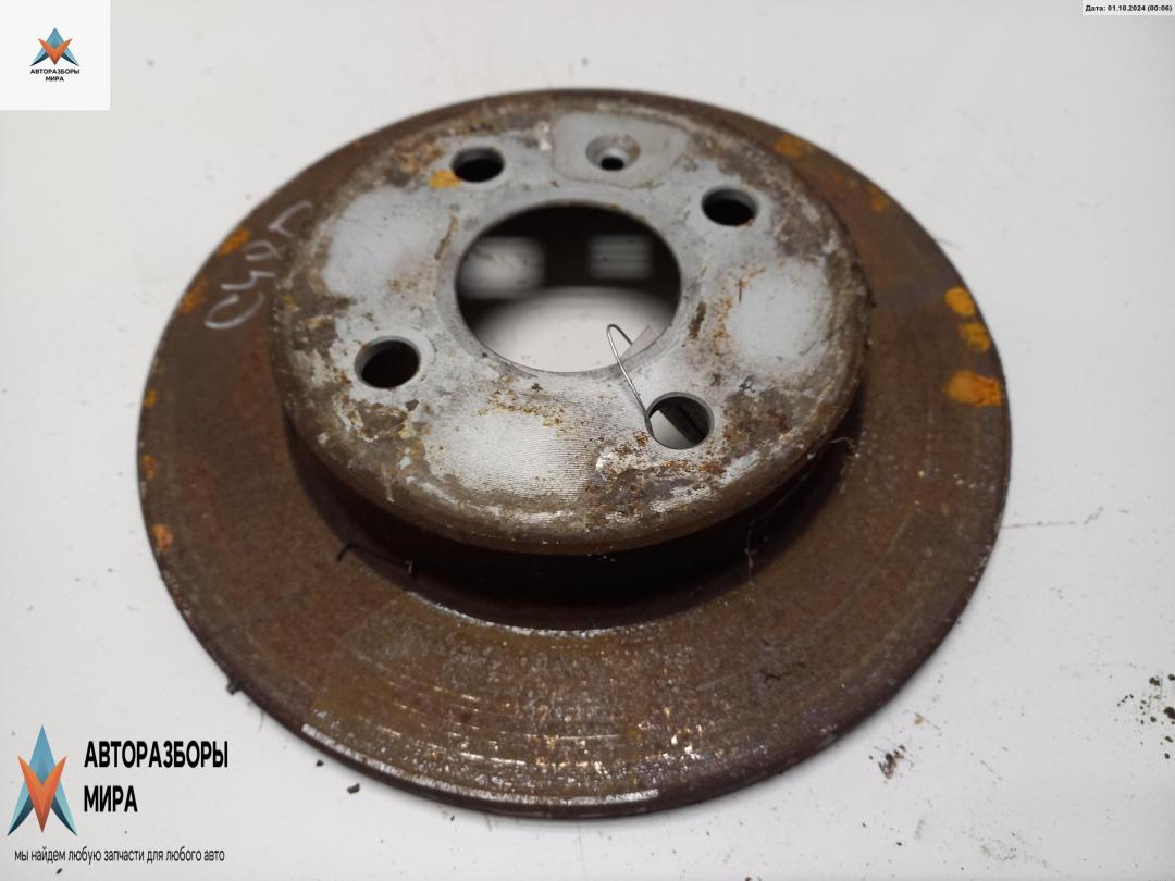 диск тормозной задний Opel Astra G 2003, 1.6 л., бензин, МКПП, чёрный, хетчбэк 5 дв. - фото №1