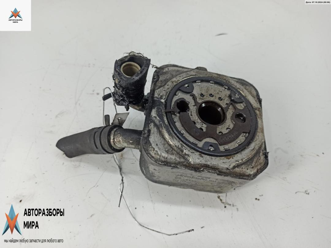 теплообменник масляного фильтра Audi A6 4B/C5 1998, 2.5 л., дизель, АКПП, зелёный, универсал, 028117021A - фото №1