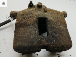 суппорт передний правый Nissan Primera P12 2002, 1.8 л., бензин, МКПП, серый, универсал