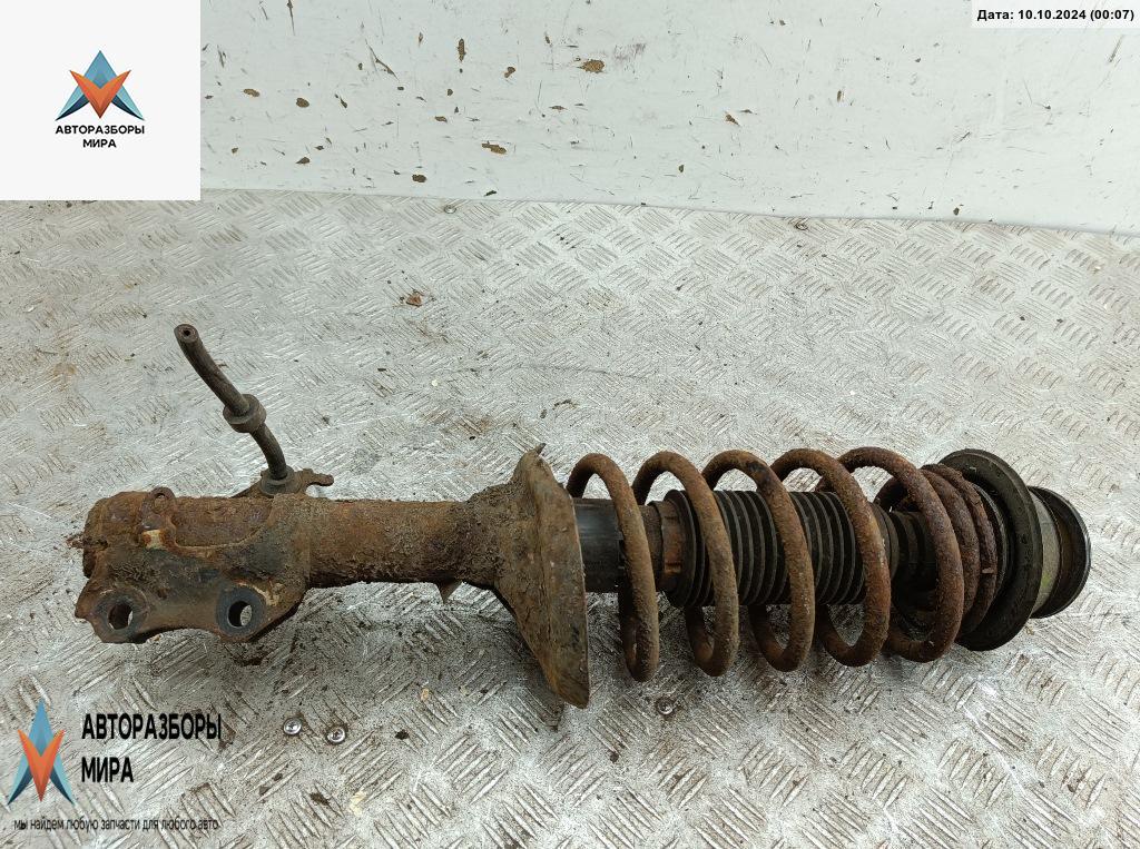 стойка передняя Volkswagen Golf 3 поколение 1992, 1.4 л., бензин, МКПП, красный, хетчбэк 3 дв. - фото №1