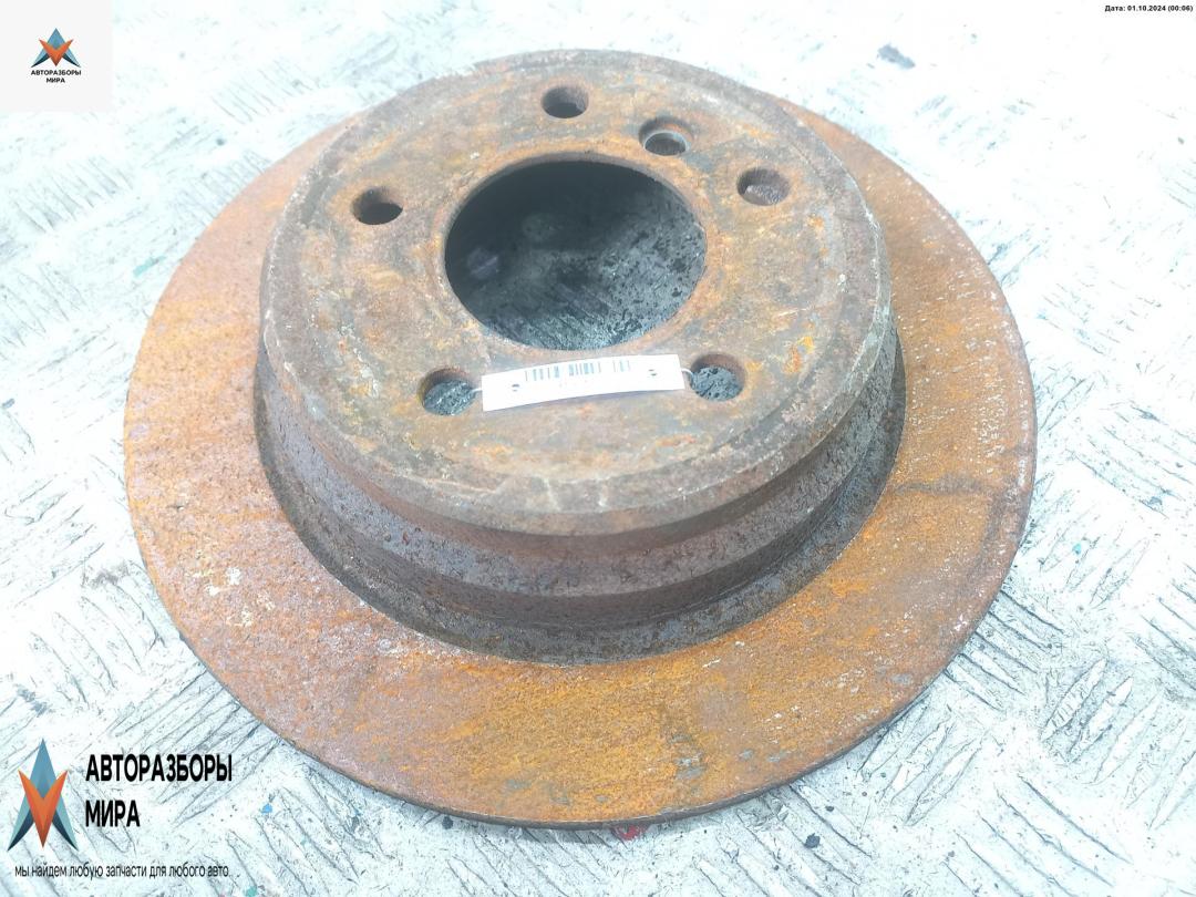 диск тормозной задний BMW 5 серия E39 1998, 2.0 л., бензин, МКПП, зелёный, седан - фото №1