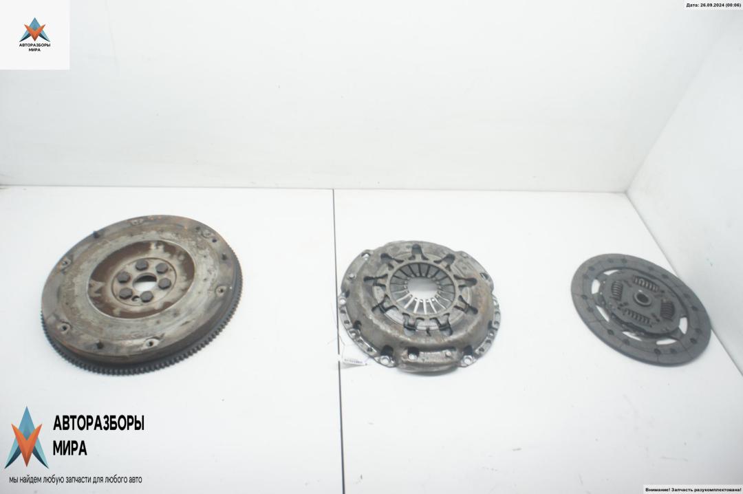 маховик Ford Focus 2 поколение 2005, 1.6 л., i, бензин, МКПП, серый, универсал, 98NN6375BA - фото №1