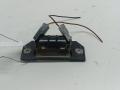 подсветка номера Ford Focus II 2004, 1.6 л., i, бензин, МКПП, серый, хетчбэк 3 дв., 3M5A13550A - фото №2