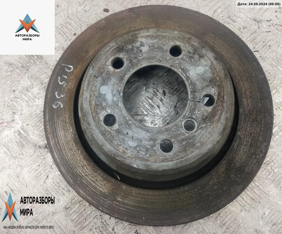 диск тормозной задний BMW 5 серия E39 1997, 2.5 л., бензин, МКПП, синий, универсал - фото №1