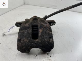 суппорт передний левый Nissan Micra 4 поколение (K13) 2012, 1.2 л., бензин, МКПП, чёрный, хетчбэк 5 дв.