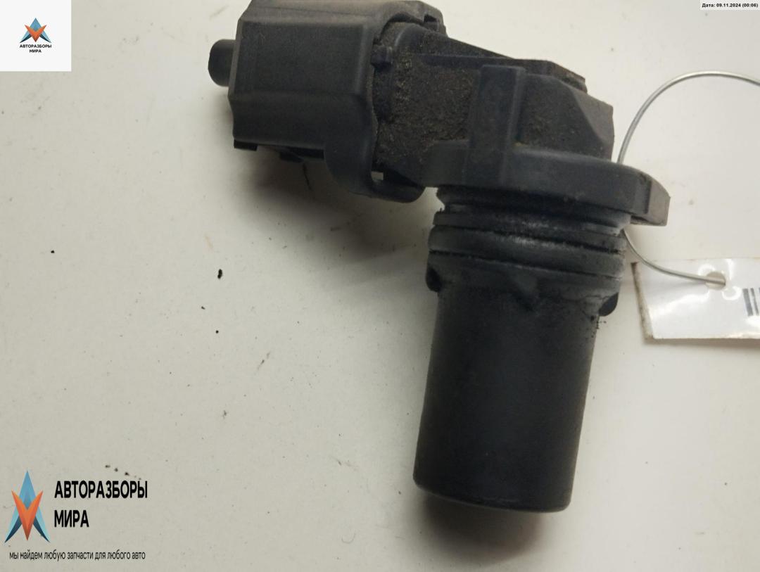 датчик распредвала Ford Focus 2 поколение 2005, 2.0 л., бензин, МКПП, синий, универсал, 1S7F42K073AD - фото №1