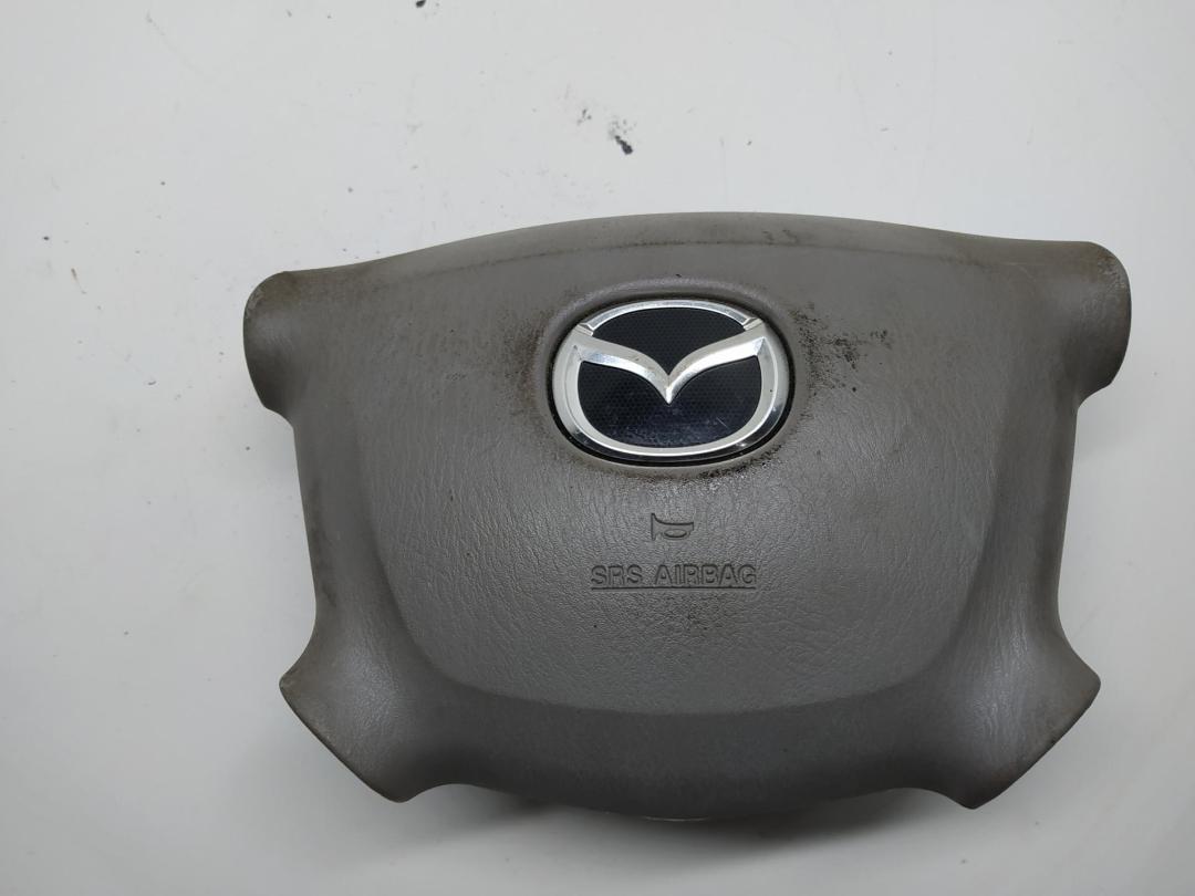 подушка безопасности водителя Mazda Demio 2000, 1.5 л., бензин, АКПП, серый, хетчбэк 5 дв., LC6357K00B05