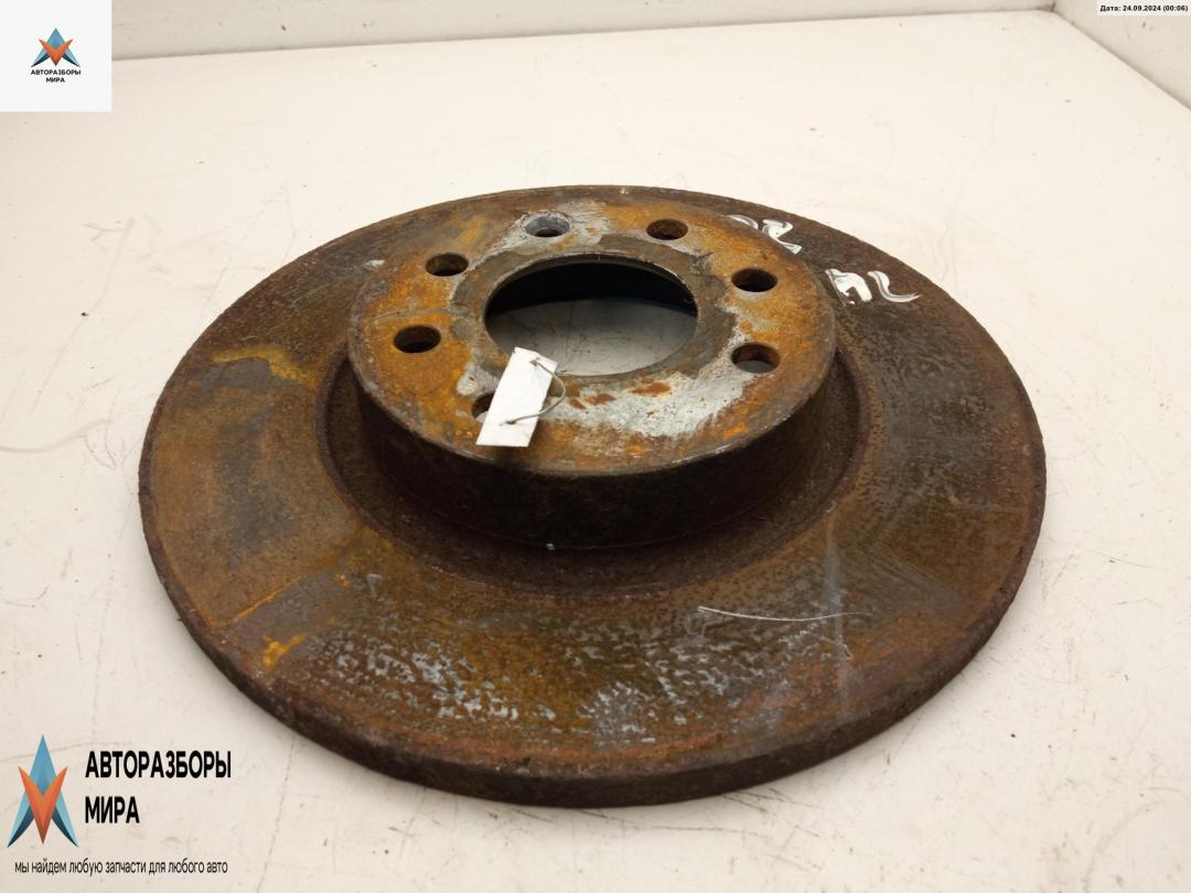 диск тормозной передний Volvo 460 1997, 1.8 л., бензин, МКПП, чёрный, седан - фото №1