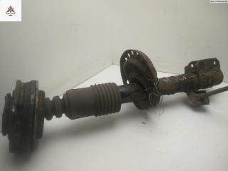 амортизатор передний левый Nissan Note E11 [рестайлинг] 2010, 1.5 л., дизель, МКПП, красный, хетчбэк 5 дв.