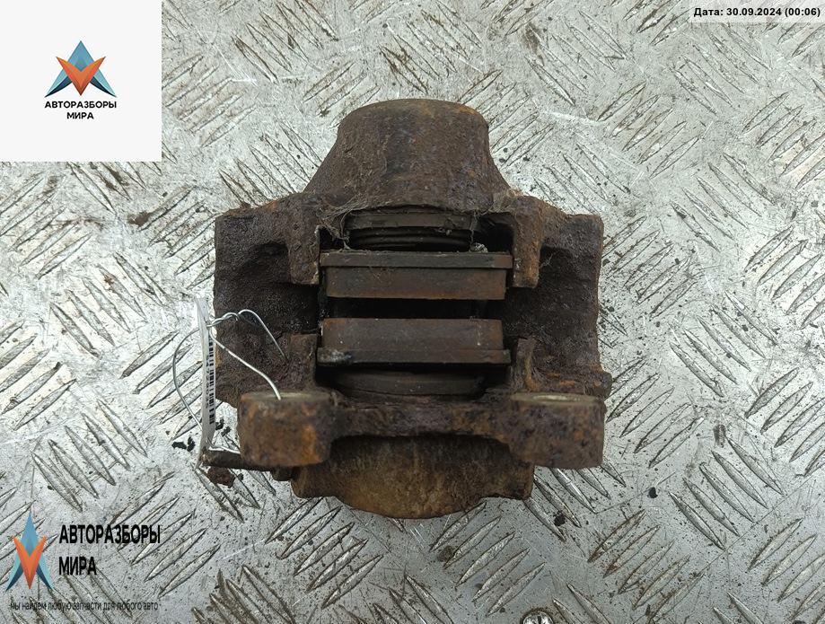 суппорт задний левый Opel Omega B 1996, 2.0 л., бензин, МКПП, зелёный, универсал - фото №1