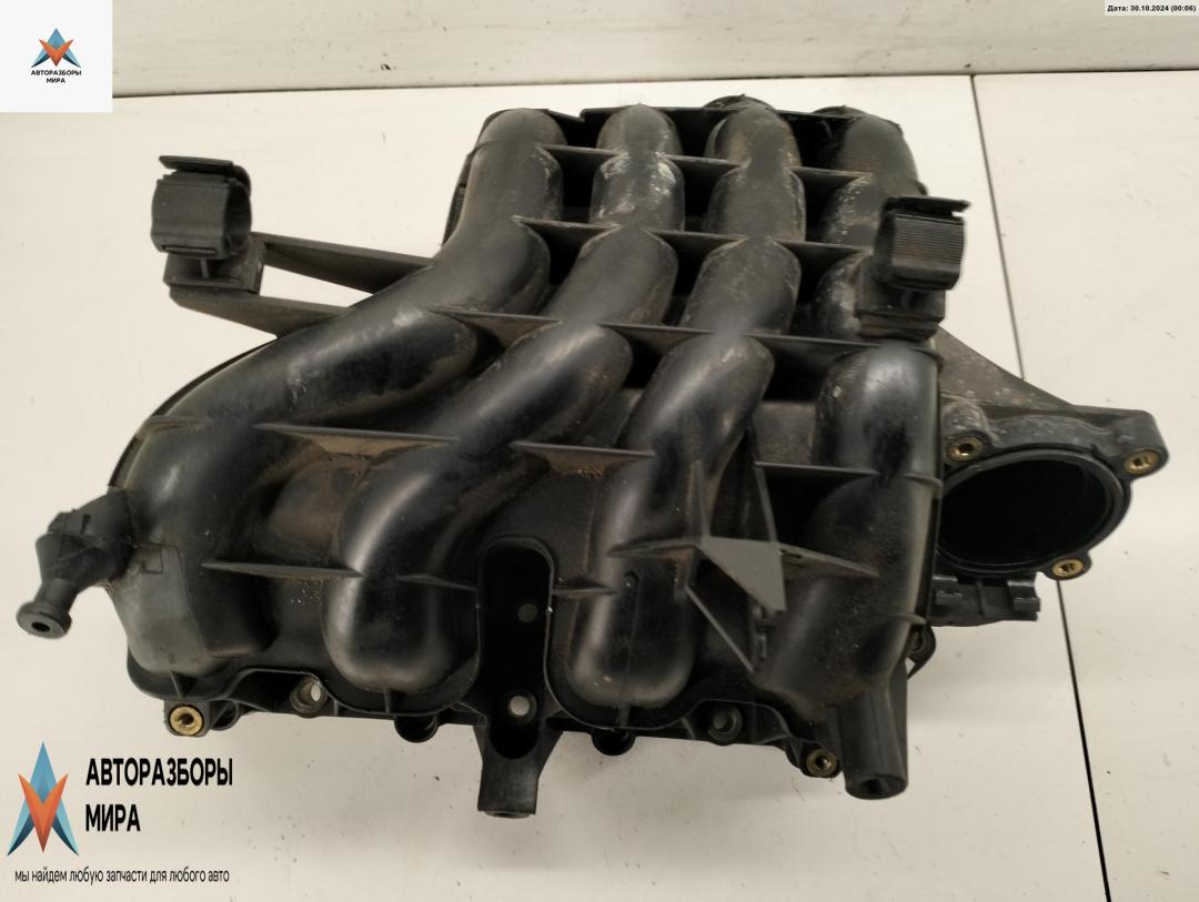 коллектор впускной Volkswagen Golf 4 поколение 1998, 1.4 л., бензин, хетчбэк 5 дв., 036129711AT - фото №1