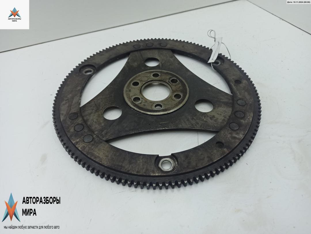 маховик Opel Astra G 2000, 1.6 л., бензин, АКПП, чёрный, хетчбэк 3 дв. - фото №1