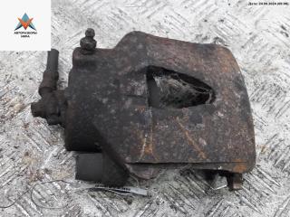 суппорт передний левый Volkswagen Golf 4 поколение 1999, 1.4 л., бензин, МКПП, зелёный, хетчбэк 5 дв.