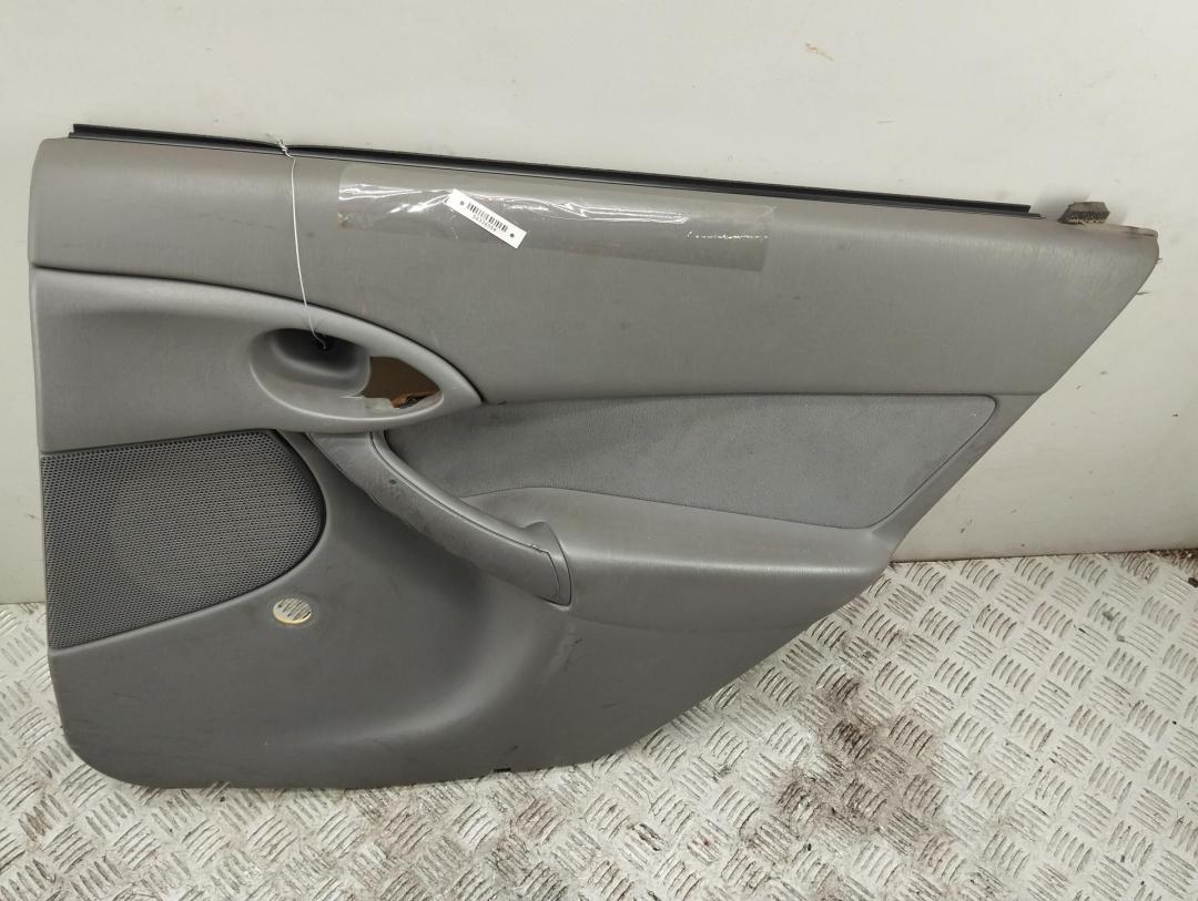 обшивка двери задняя правая Ford Focus 1 поколение 1999, 1.6 л., i, бензин, МКПП, серый, универсал - фото №1