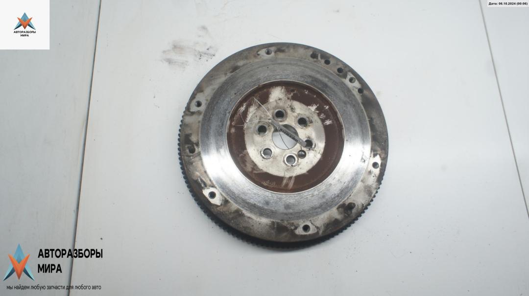 маховик Ford Focus 1 поколение 1999, 1.6 л., i, бензин, МКПП, зелёный, хетчбэк 5 дв. - фото №1