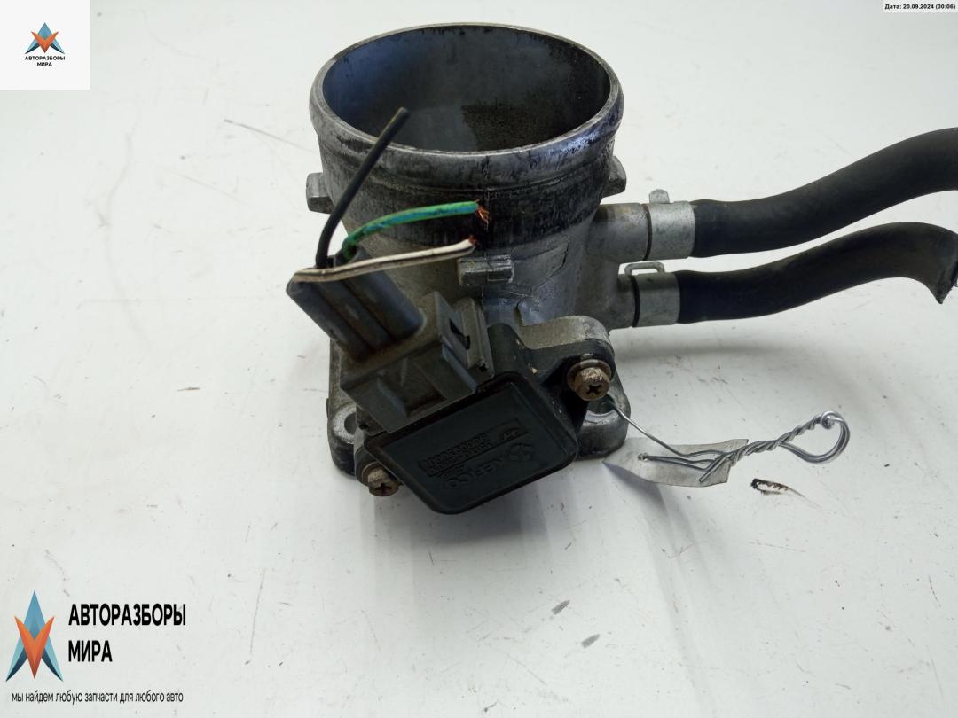 заслонка дроссельная Hyundai Lantra J2 1996, 2.0 л., бензин, МКПП, зелёный, седан, 3517022010 - фото №1