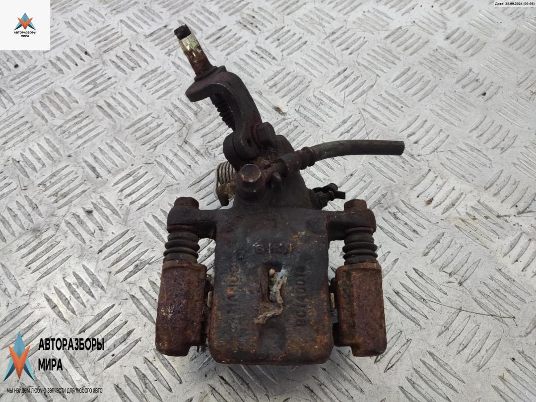 суппорт задний левый Hyundai Coupe RD 1996, 2.0 л., бензин, МКПП, зелёный, купе - фото №1