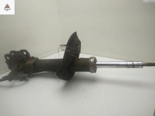 амортизатор передний левый Mitsubishi Outlander 2 поколение 2008, 2.0 л., дизель, МКПП, серый, внедорожник 5 дв.