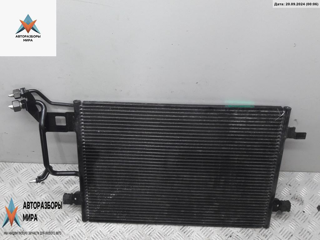 радиатор кондиционера Volkswagen Passat B5 1999, 1.8 л., бензин, МКПП, чёрный, седан, 8D0260406H - фото №1