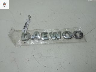 эмблема Daewoo Kalos 1 поколение 2003, 1.4 л., бензин, МКПП, синий, хетчбэк 5 дв.