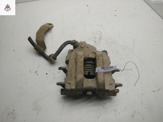 суппорт задний левый Ford Maverick 2 поколение [рестайлинг] 2005, 2.3 л., бензин, МКПП, чёрный, внедорожник 5 дв.