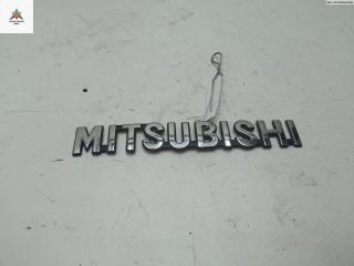 эмблема Mitsubishi Outlander 2 поколение [рестайлинг] 2010, 2.4 л., бензин, АКПП, чёрный, внедорожник 5 дв.